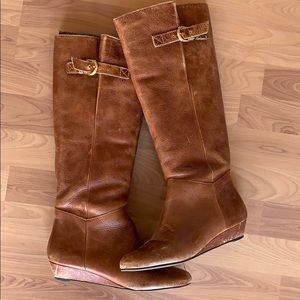 Tall brown leather boots